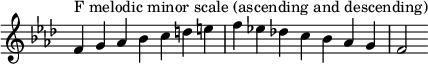  {
\override Score.TimeSignature #'stencil = ##f
\relative c' {
  \clef treble \key f \minor \time 7/4
  f4^\markup "F melodic minor scale (ascending and descending)" g aes bes c d e f es! des! c bes aes g f2
} }
