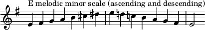  {
\omit Score.TimeSignature \relative c' {
  \key e \minor \time 7/4 e^"E melodic minor scale (ascending and descending)" fis g a b cis dis e d! c! b a g fis e2
} }
