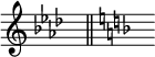 { \omit Score.TimeSignature { \key aes \major s8^"" \bar "||" \key f \major s8^""}}