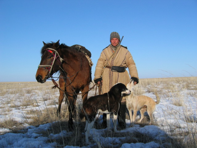 Файл:Kazakh shepard with dogs and horse.jpg