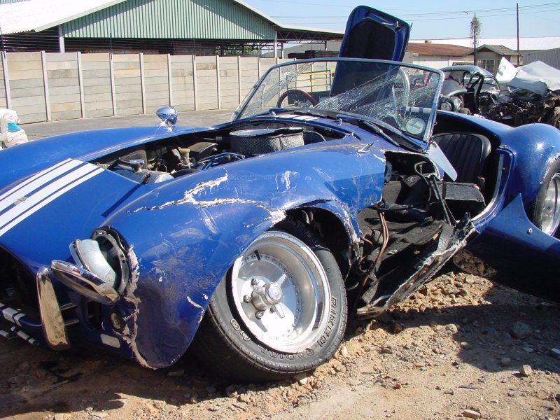 File:Crashed sports car.jpg