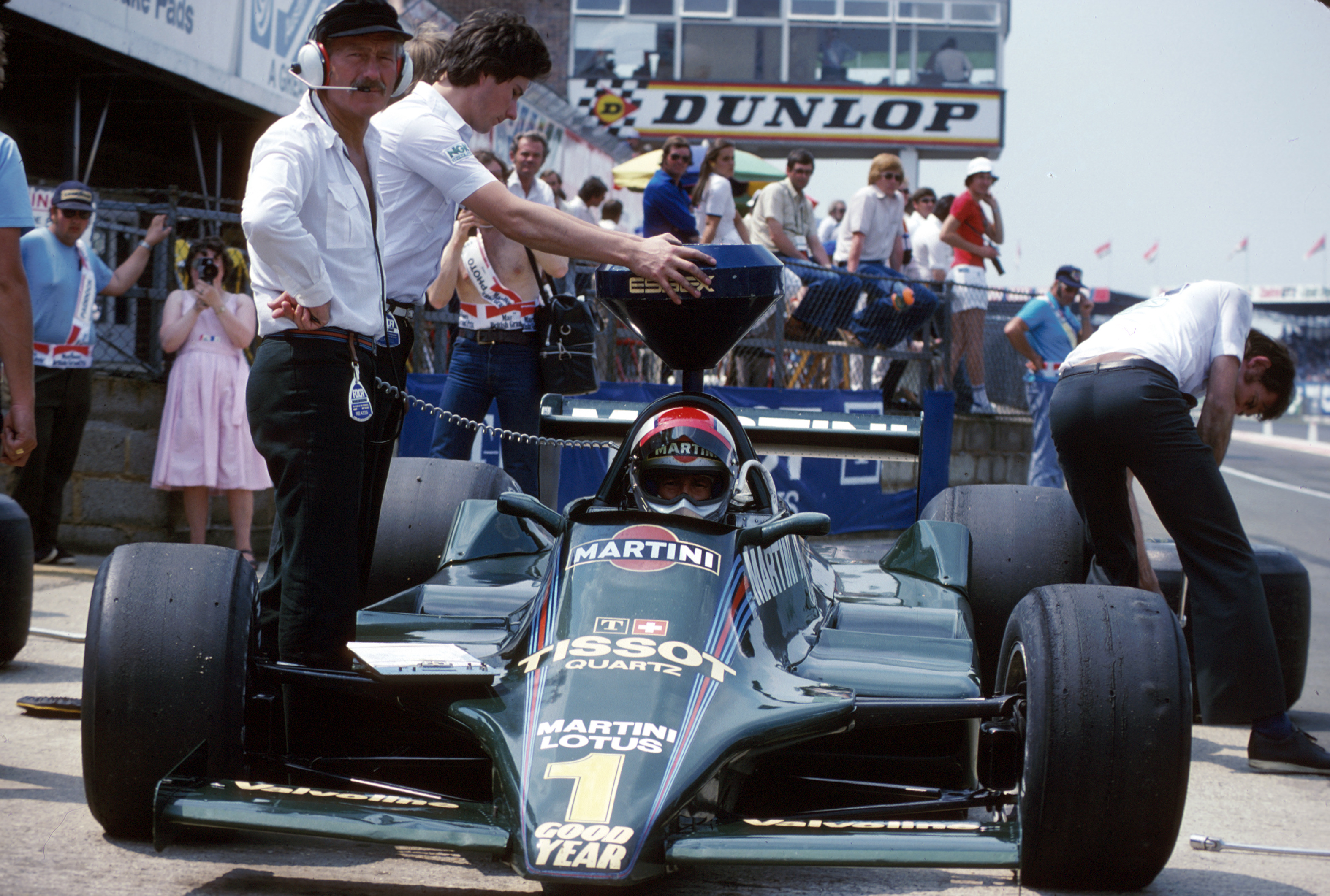 Mario Andretti in the 79 chatting via radio to Team Lotus boss Colin Chapman.