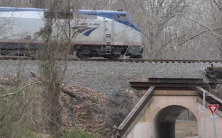 File:Amtrak train at Colchester Overpass aka Bunnyman Bridge.jpg