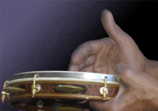 File:Pandeiro in hands.jpg