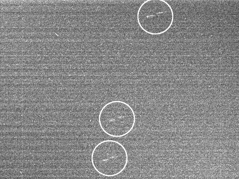 Archivo:First moonlets PIA07792 (closeup).jpg