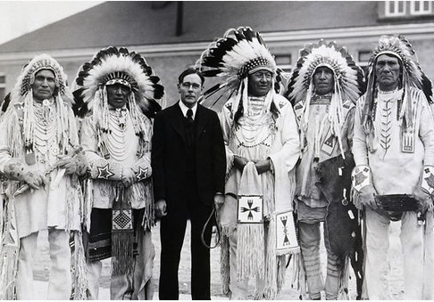 Collier in a 1934 meeting with South Dakota Blackfoot Indian chiefs to discuss the Wheeler-Howard Act.