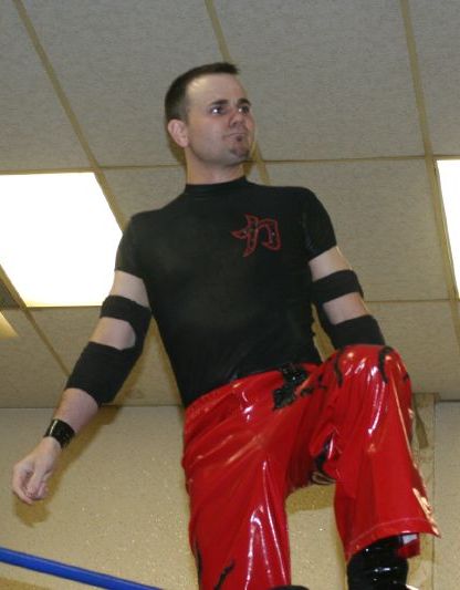 File:Quackenbush posing on turnbuckles.jpg