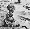 Injured Chinese baby crying after Japanese bomb attack in Shanghai, August 28, 1937