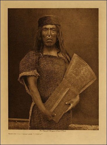 File:Kwakwaka'wakw man and copper shield, by Edward Curtis.jpg