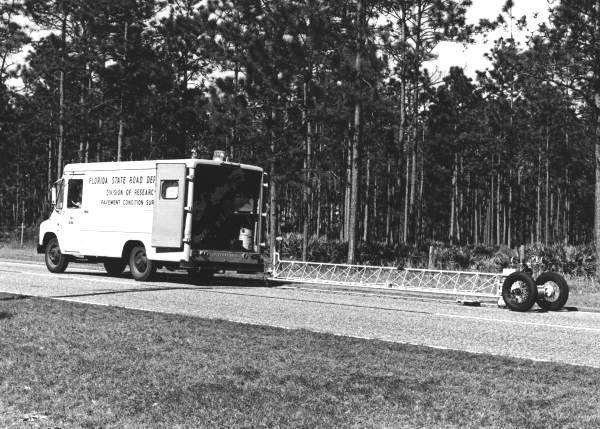 File:Van pulling a road profilometer.jpg