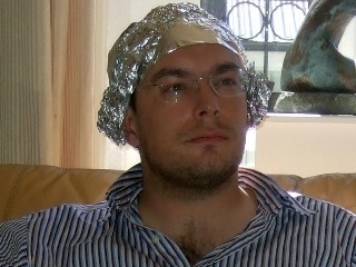 File:ManWearingTinFoilHat.jpg