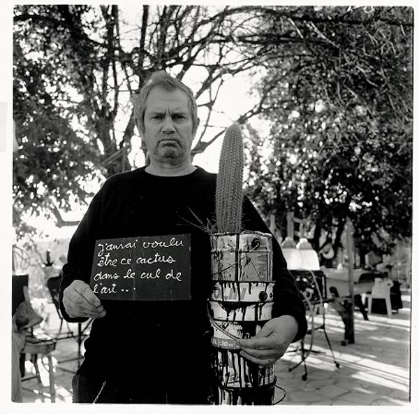 File:Ben Vautier holding a cactus.jpg