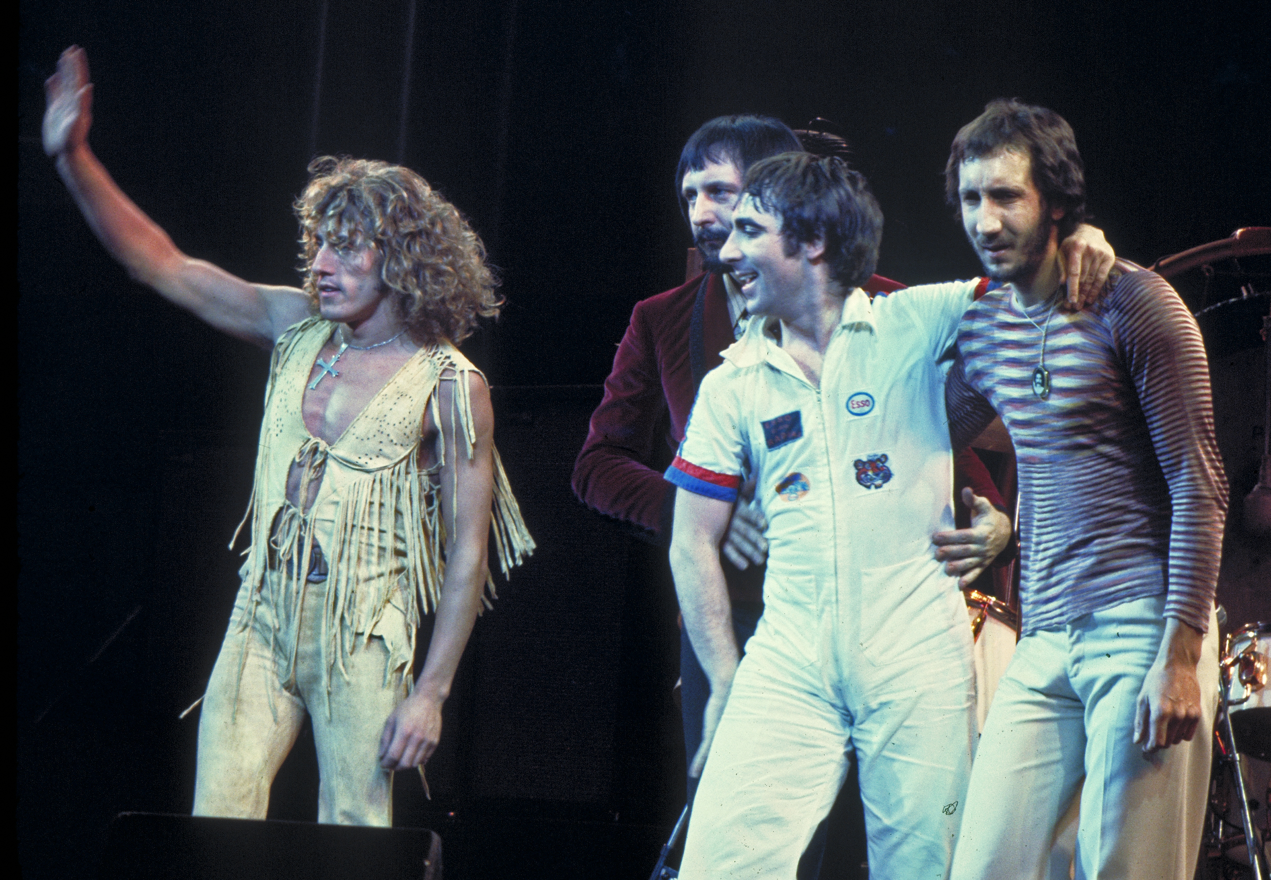 The Who at a 1975 curtain call. Left to right: Roger Daltrey, John Entwistle, Keith Moon, Pete Townshend