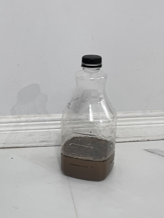 A bottle of Jenkem which has been fermented for a period of 30 days.