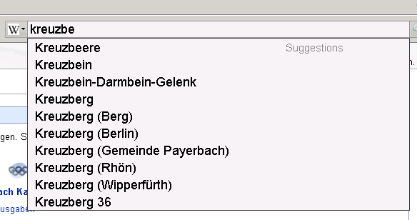 Pulldown menu captioned "Suggestions" with the words "Kreuzbeere", "Kreuzbein", "Kreuzbein-Darmbein-Gelenk", etc.