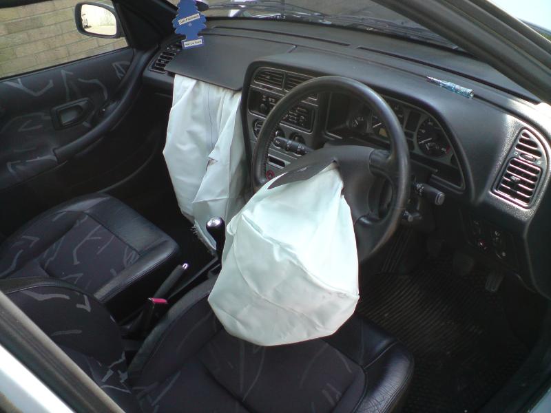 File:Peugeot 306 airbags deployed.jpg