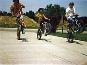 Boys cycling during summer