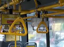 Bus grab handles in Bengaluru, India.