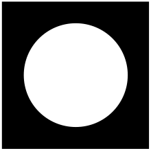 A white circle on a black square background