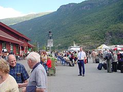 Tourists at the railway station in Flåm. The station has the village's only public toilets