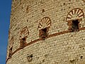 Detail of cavities in the brick.