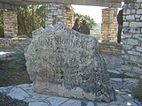 An engraved rock at the top of Mount Bonnell.