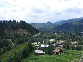 View of Palanca, with road and railway running towards the Ghimeș-Palanca Pass