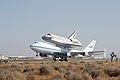 Shuttle Carrier Aircraft N905NA carries Discovery as it leaves Edwards AFB on its way to Kennedy Space Center, Florida.