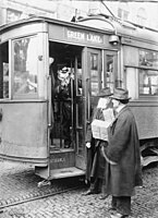 Passenger without mask being refused boarding of a streetcar amid 1918 flu pandemic. (Seattle, Washington, 1918)