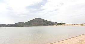 A photo of Lake Altus and granite peaks in Quartz Mountain State Park