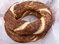 A simit is a small circular Turkish bread with sesame seeds