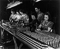 Women made 37mm antitank shells for the war in 1942 at Aluminum Industries, Inc. in Cincinnati.