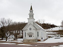 The Church of St. Thomas was built in 1870 as focal point of state's oldest Irish farming settlement, established in the 1850s, and is listed on the National Register of Historic Places.[1]