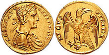 A gold coin, which depicts the bust of a man and an eagle