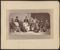 Dōst Moḥammad Khan seated slightly to the right of center in this photograph. To Dōst Moḥammad’s right, the first figure in a white chapan (overcoat) is his son and successor Sher ʻAlī Khān (1825–1879), who ruled Afghanistan from 1863 to 1879. Abd al-Raḥmān Khān (c. 1844 – 1901), the grandson of Dōst Mohammad and future “Iron Amir” of Afghanistan, is on Dōst Moḥammad’s far left.