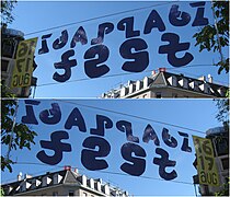 A practical application of mirror ambigrams in a banner reading "Idaplatz fest" front and back (Zürich, 2008).