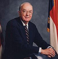 A photograph of a man wearing formal attire