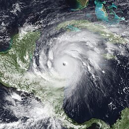 Satellite image of an intense tropical cyclone over the Western Caribbean Sea with a large and well defined eye.