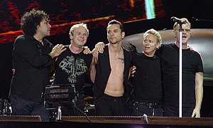 Depeche Mode performing in 2006. From left to right: Peter Gordeno, Christian Eigner, Dave Gahan, Martin Gore, and Andy Fletcher