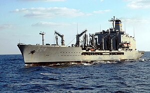 USNS Rappahannock transits alongside the aircraft carrier USS George Washington (CVN 73) after a replenishment at sea.