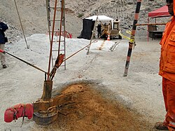 an image of one of the two narrow tubes used to deliver supplies to the miners 2,000 feet below