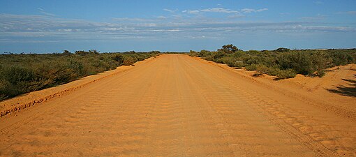 Semi-cohesive soil on a road in Kalbarri National Park, Western Australia.