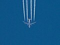 An Airbus A340 of Lufthansa leaves contrails behind