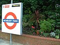 Roundel near northern end of westbound platform.