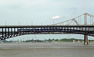 A MetroLink train crosses the Eads Bridge