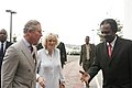 Prince Charles and the Duchess of Cornwall are welcomed by Tobago House of Assembly Chief Secretary Orville London