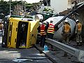 An overturned cement mixer