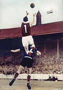 Ian McKay leaps for a spectacular mark in the 1952 SANFL Grand Final