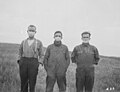 Albertan farmers wearing masks to protect themselves from the flu.