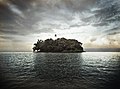 A small, volcanic, tropical island inside the Nicaraguan lake Cocibolca (or Lake Nicaragua).